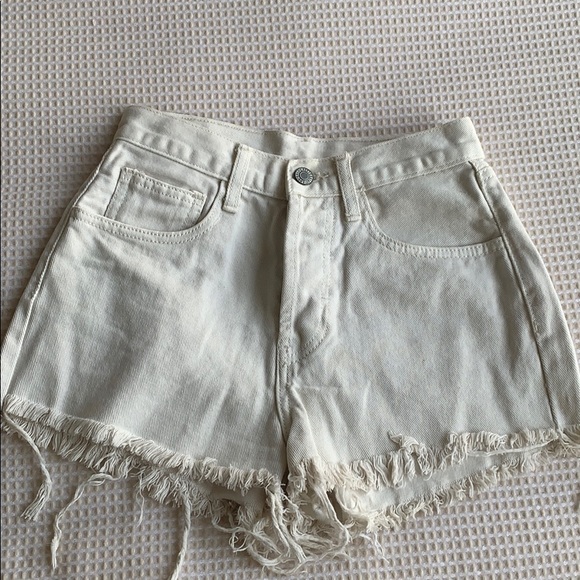 PacSun Pants - Pacsun Cream denim cut off shorts size small(24)